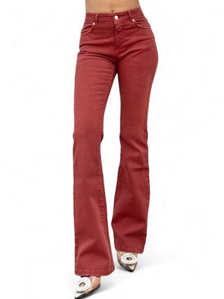 Pantaloni flared in drill sienna con trattamenti denim