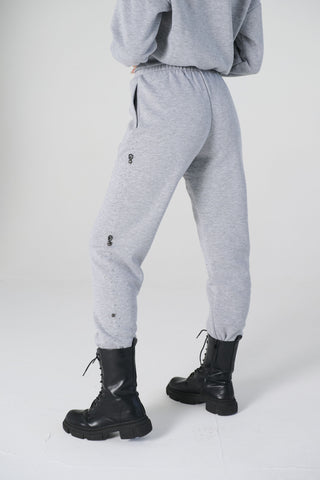 Pantaloni jogger grigio in felpa candy cotton con applicazione laterale