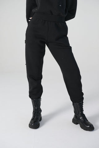 Pantaloni jogger nero in felpa candy cotton con applicazione laterale