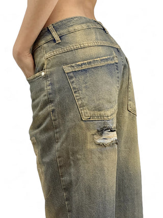 Pantaloni relaxed in denim perlato oro