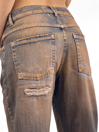 Pantaloni relaxed in denim perlato ruggine